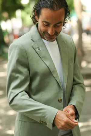 Americana verde de algodón.